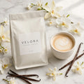 Velora French Vanilla coffee bag with vanilla flowers and a creamy coffee